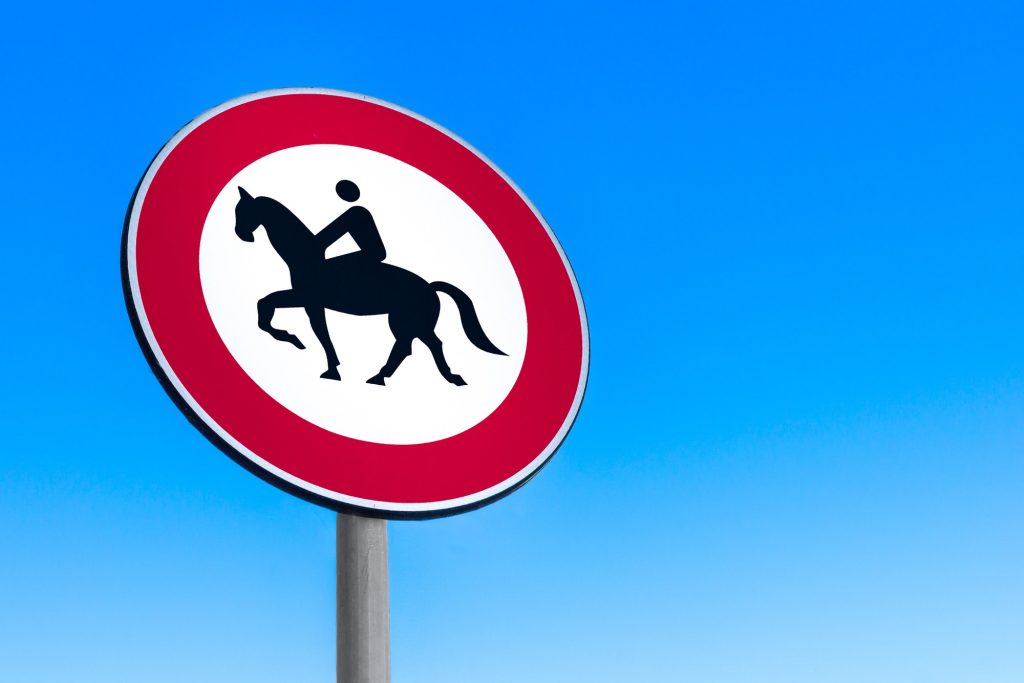 Road sign to prohibit passage with horse.